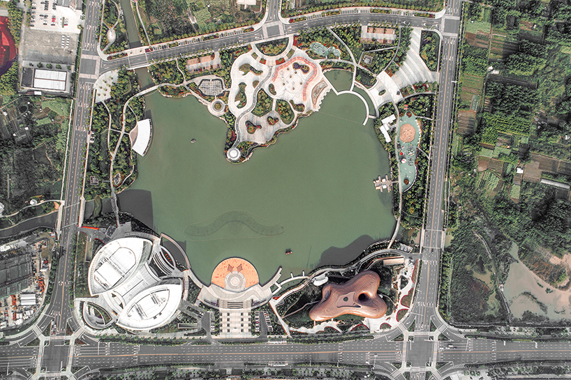 organic lines and undulating greenery form CROX's liyang museum in china designboom