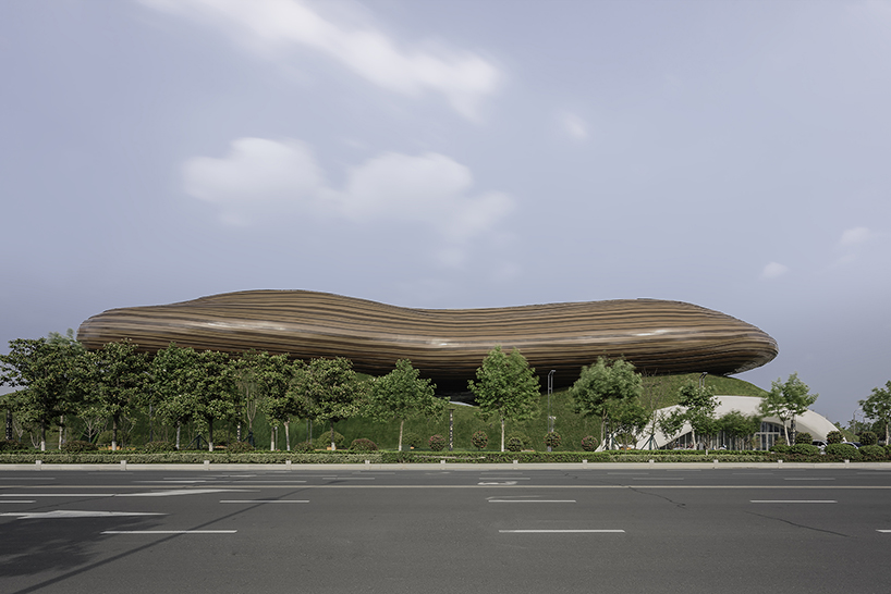 organic lines and undulating greenery form CROX's liyang museum in china designboom