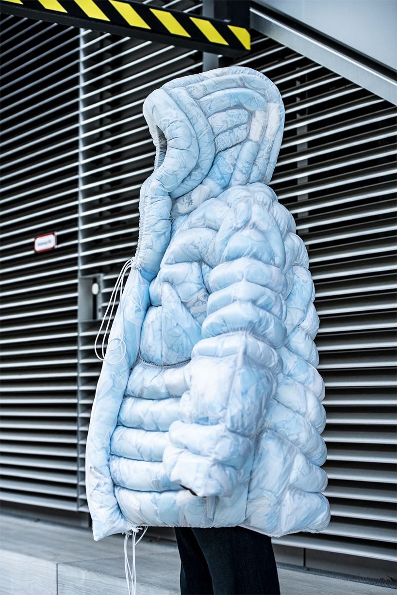 tobia zambotti presents coat-19, a puffer jacket filled with used