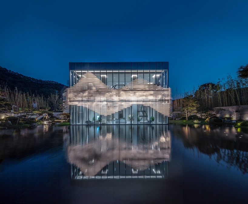 aoe adds ethereal fog and rippled louvers to building in china