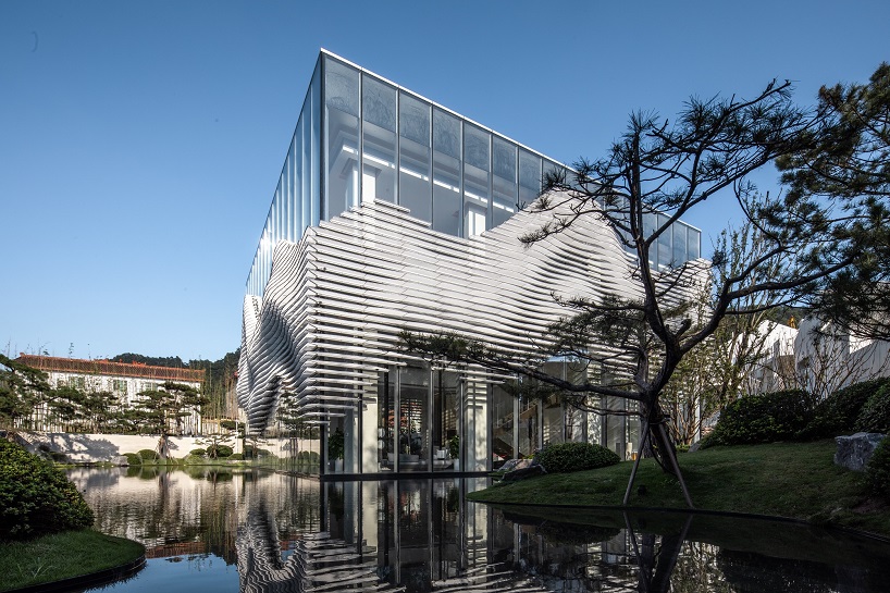 aoe adds etheral fog and rippled louvers to building in china