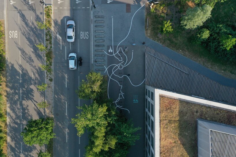 vincent broquaire's drawings add whimsy to streets of rennes to redefine urban spaces