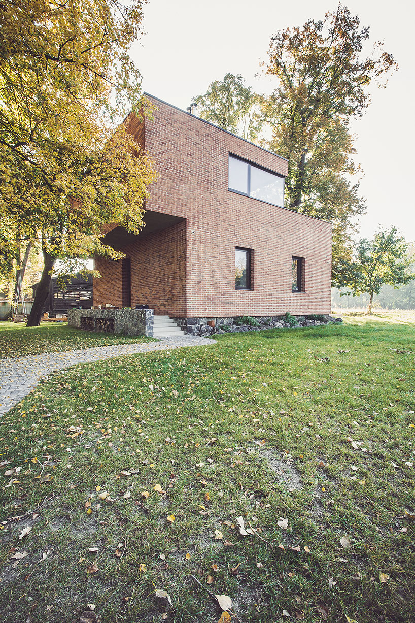 edit! renovates an old brick guardhouse to create a family home in prague designboom