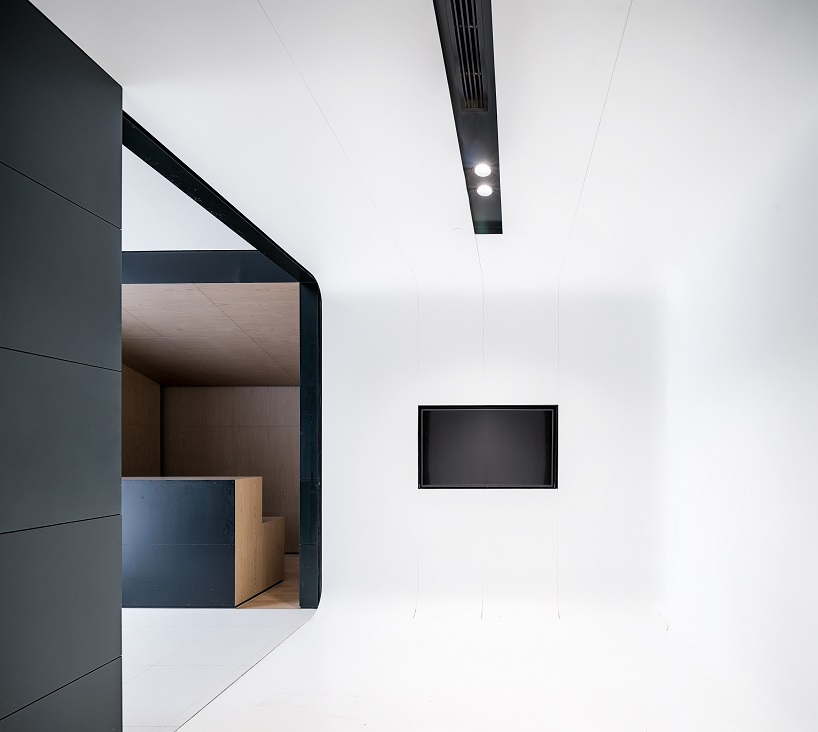DUTS design creates a 'floating' conference room inside shanghai office renovation designboom