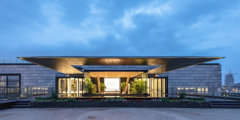 DUTS design creates a 'floating' conference room inside shanghai office renovation designboom