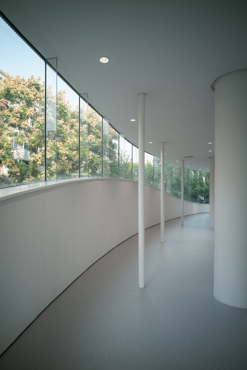 heimat architects shapes curved, elevated structure for USTC learning center in china