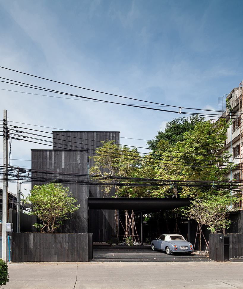 black timber clads IDIN architects’ tranquil office space in bangkok