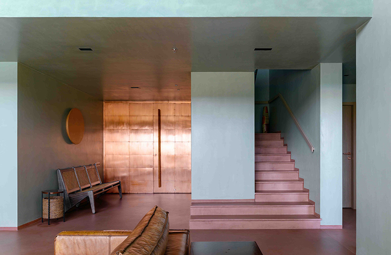 block green walls and burnt sienna floors define FADD studio's ash abode in india designboom