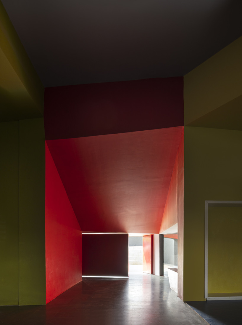 pyramidal steel roof by thirdspace tops university's sports arena in india