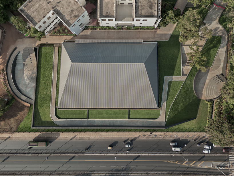 pyramidal steel roof by thirdspace tops university's sports arena in india