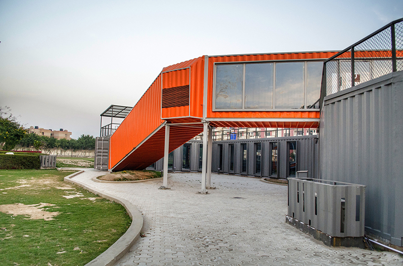 RJDL builds cafe infinity from recycled shipping containers in india