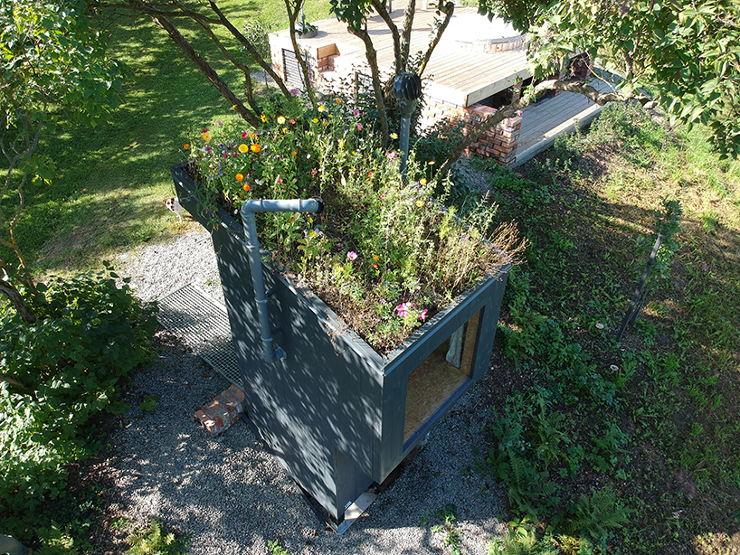 zeltini studio's wooden 'temple of poop' is a compost toilet with a view designboom