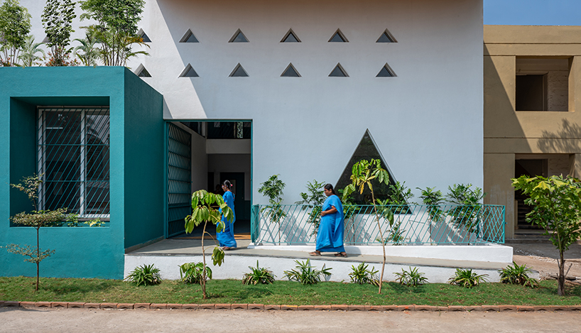 projected cantilevers and recessed windows in vibrant hues compose sanskruti school in india