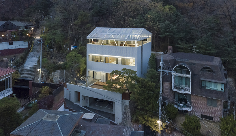 bcho architects associates clads house in seoul in a sheer metal screen