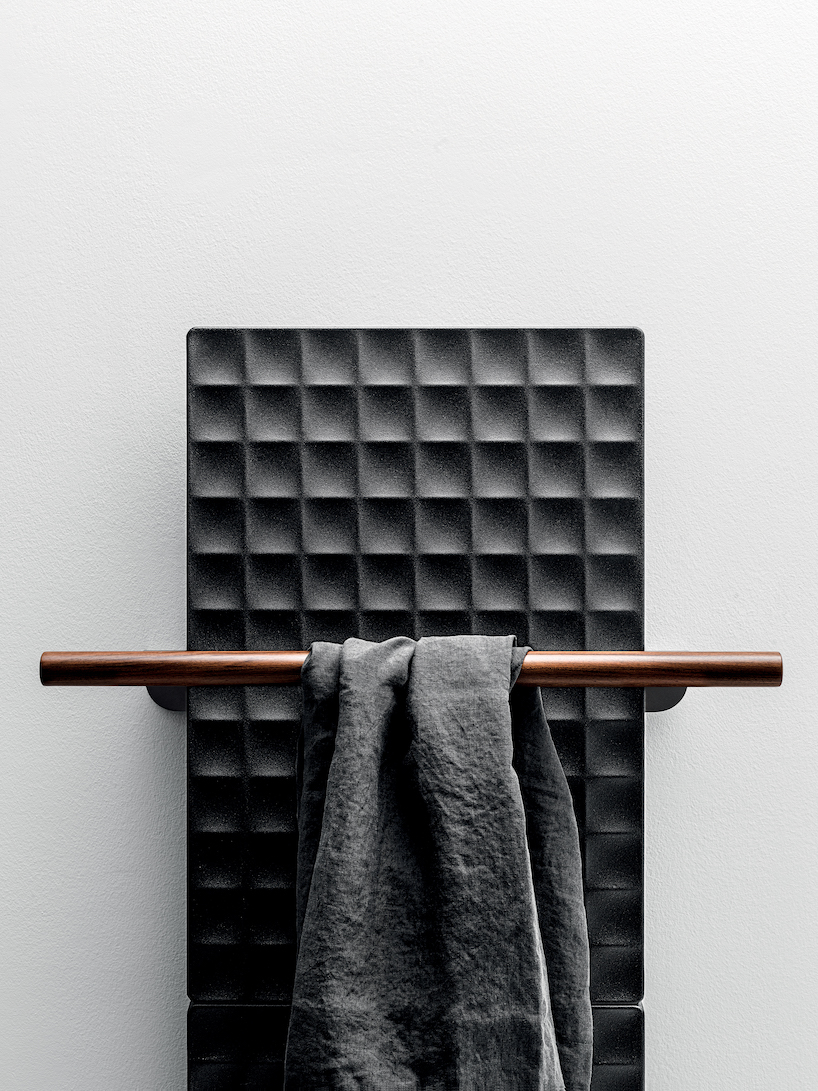 piero lissoni's 'waffle' reinterprets cast iron radiators with satisfying 3D geometric texture