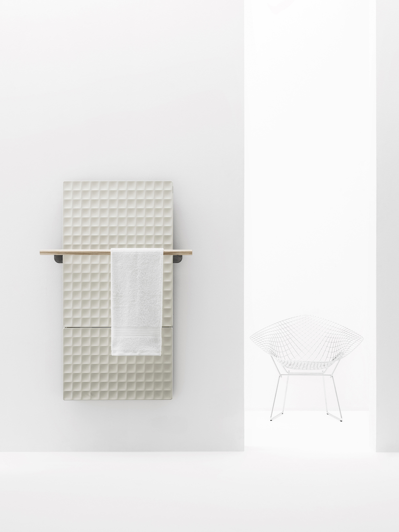 piero lissoni's 'waffle' reinterprets cast iron radiators with satisfying 3D geometric texture