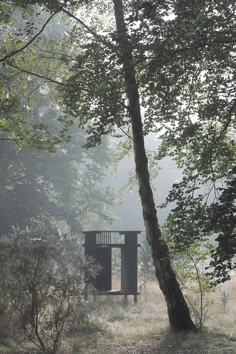 inclume architects' cabin is a remote bird watching retreat in british woodlands