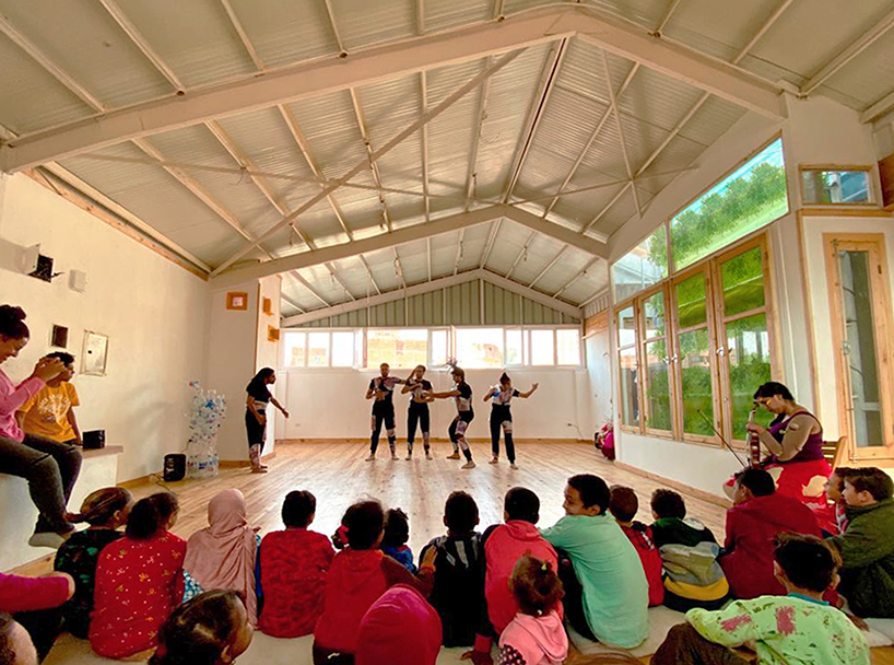 ahmed hossam saafan builds a yellow cultural center in one of cairo's most populated slums