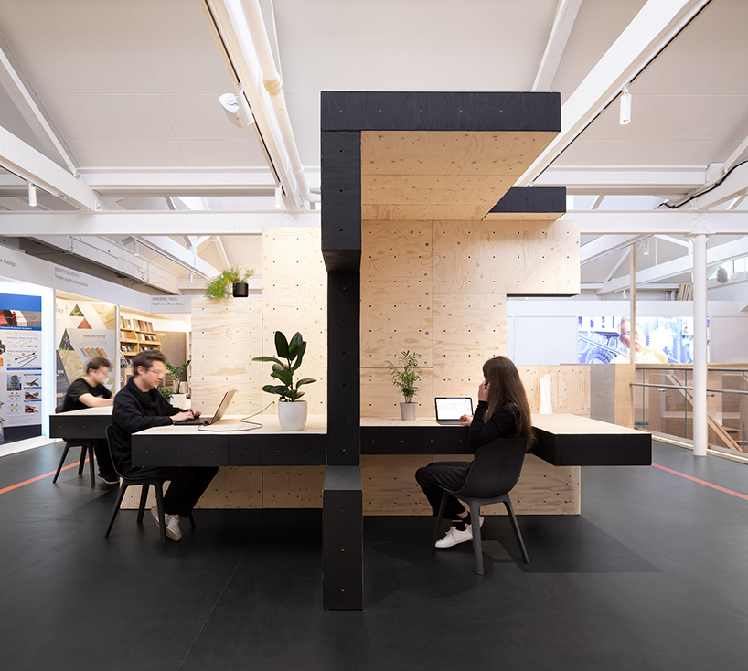 AUAR uses robotically fabricated timber blocks to build temporary home-office in london designboom