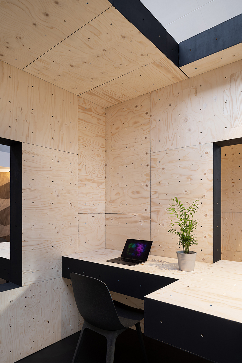 AUAR uses robotically fabricated timber blocks to build temporary home-office in london designboom