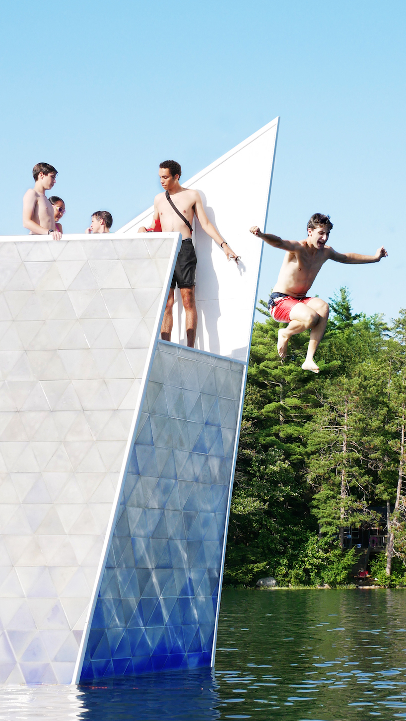 thermochromic tiles of recycled HDPE clad the 'iceberg' diving platform by bulot+collins designboom