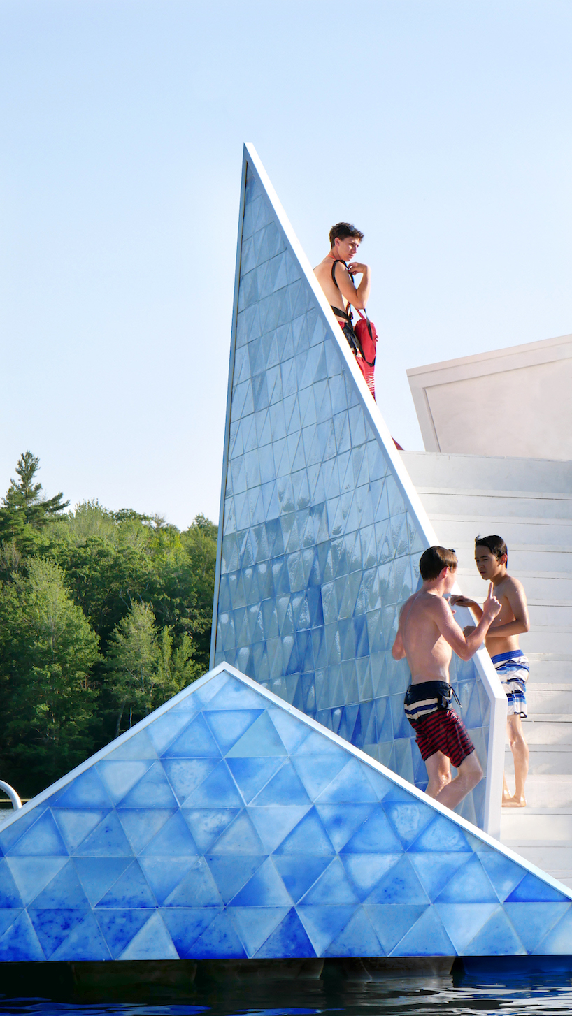 thermochromic tiles of recycled HDPE clad the 'iceberg' diving platform by bulot+collins designboom