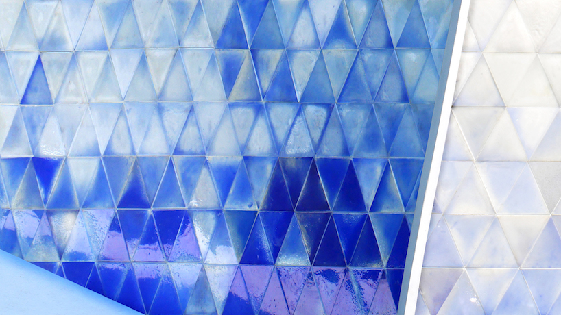 thermochromic tiles of recycled HDPE clad the 'iceberg' diving platform by bulot+collins designboom