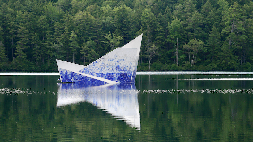 thermochromic tiles of recycled HDPE clad the 'iceberg' diving platform by bulot+collins designboom