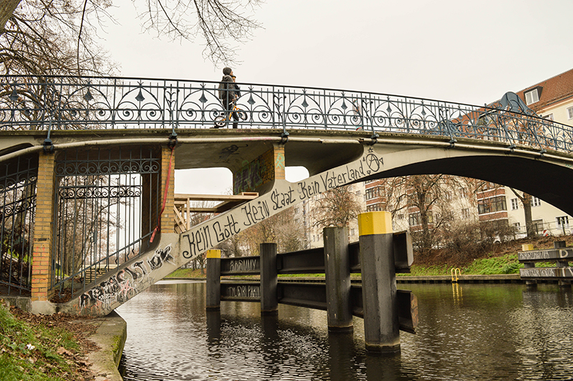 brückenbunker is an urban micro refuge tucked under a pedestrian bridge in berlin designboom