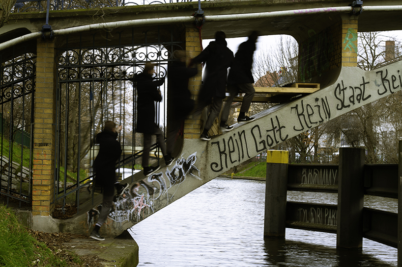 brückenbunker is an urban micro refuge tucked under a pedestrian bridge in berlin designboom