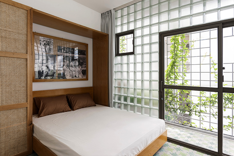room+ design & build renovates tiny house in vietnam with glass-block façades