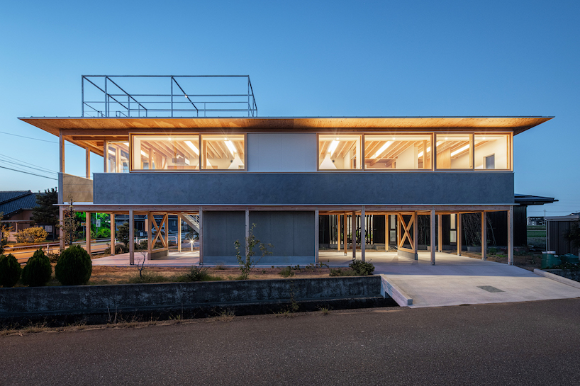 open ground floor breathes life into raised house in japan