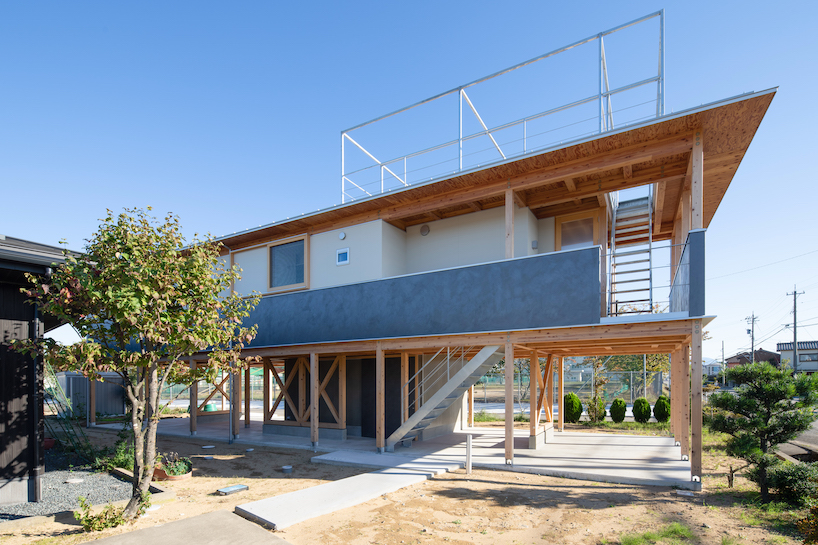 open ground floor breathes life into raised house in japan