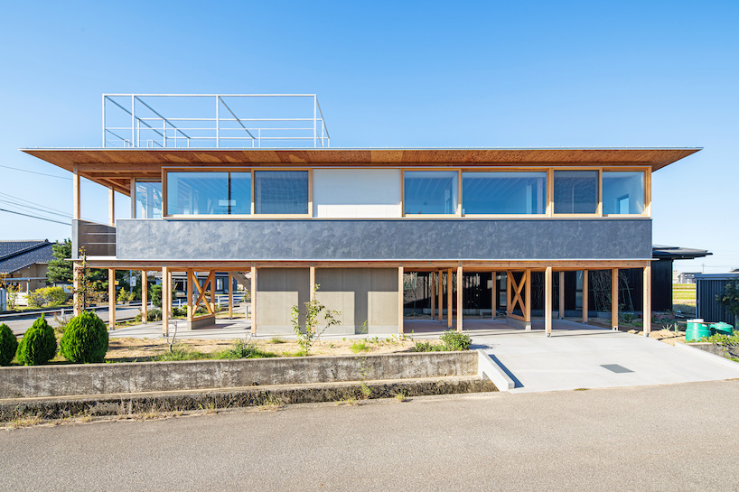 open ground floor breathes life into raised house in japan