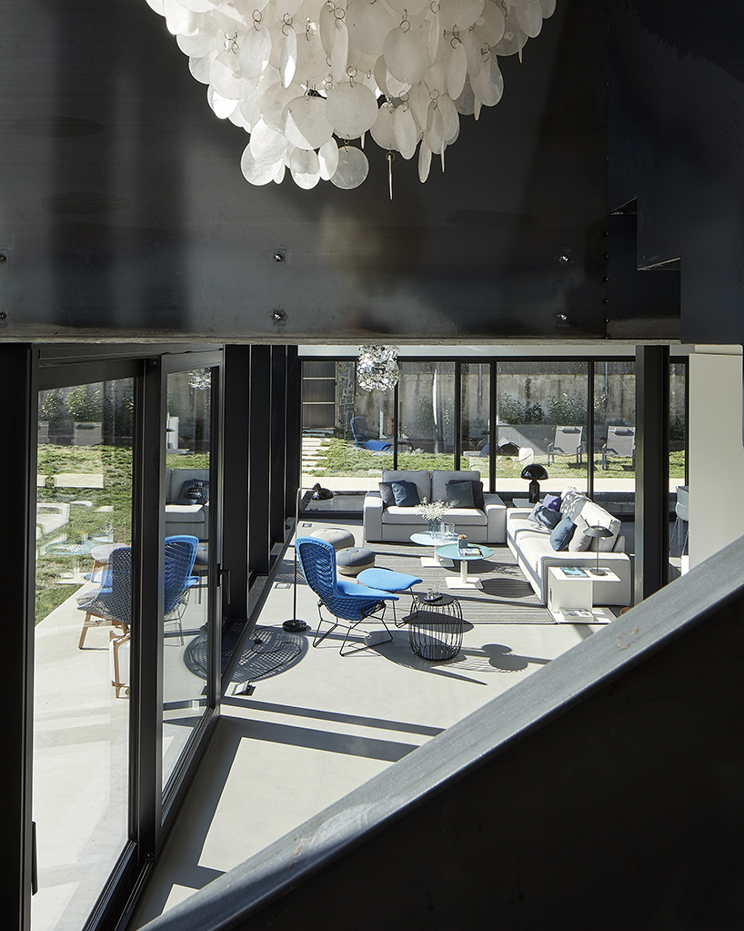 rob dubois articulates barcelona residence in heavy concrete and glass