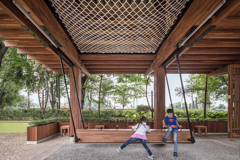 SHAU forms an elevated 'microlibrary' from prefabricated timber in indonesia designboom