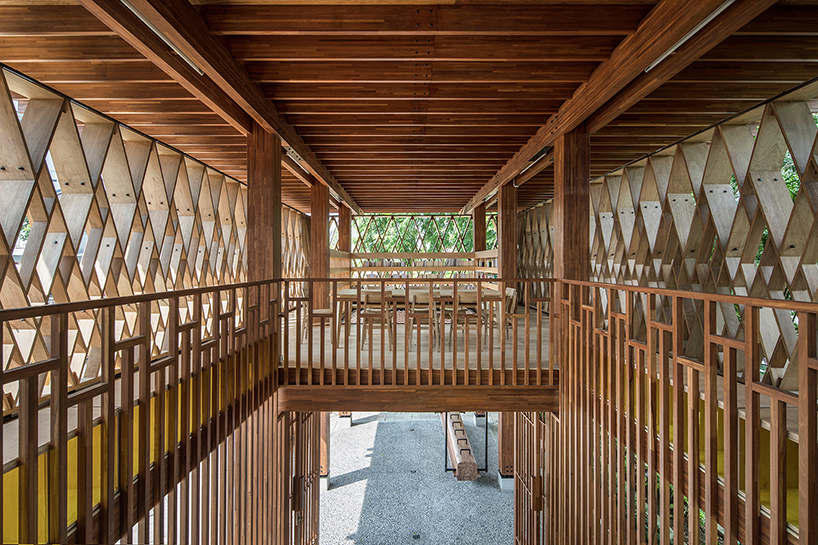 SHAU forms an elevated 'microlibrary' from prefabricated timber in indonesia designboom