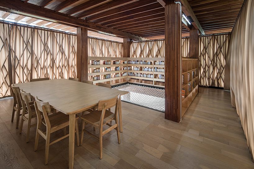 SHAU forms an elevated 'microlibrary' from prefabricated timber in indonesia designboom