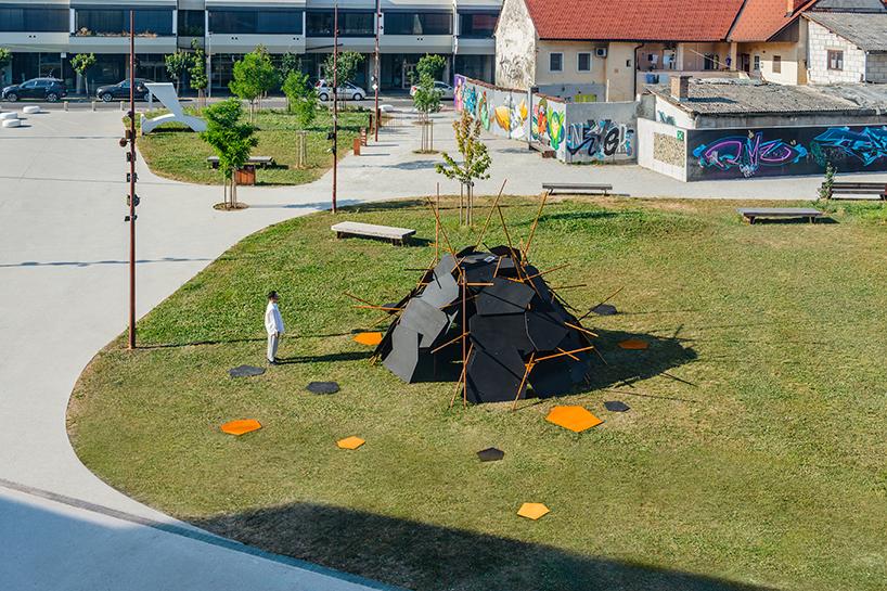 cheng tsung feng plans dragon nest installation out of wood and metal in ljubljana