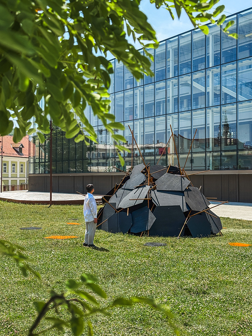 cheng tsung feng plans dragon nest installation out of wood and metal in ljubljana