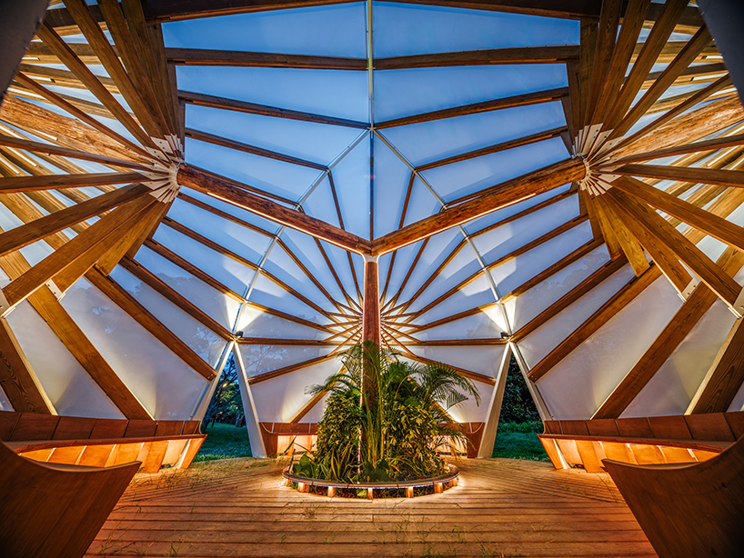 three angular canopies echo traditional oil-paper umbrellas in cheng tsung feng's installation
