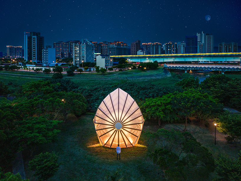 three angular canopies echo traditional oil-paper umbrellas in cheng tsung feng's installation