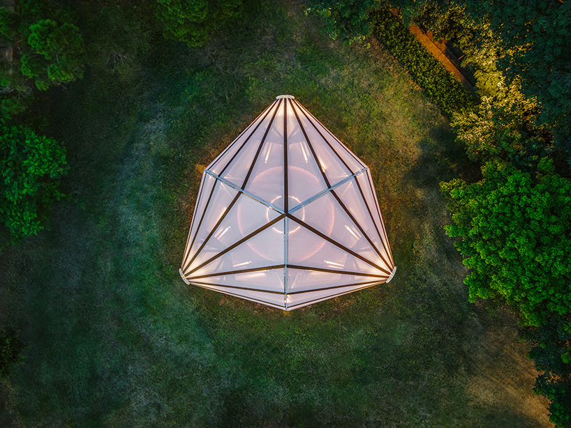 three angular canopies echo traditional oil-paper umbrellas in cheng tsung feng's installation