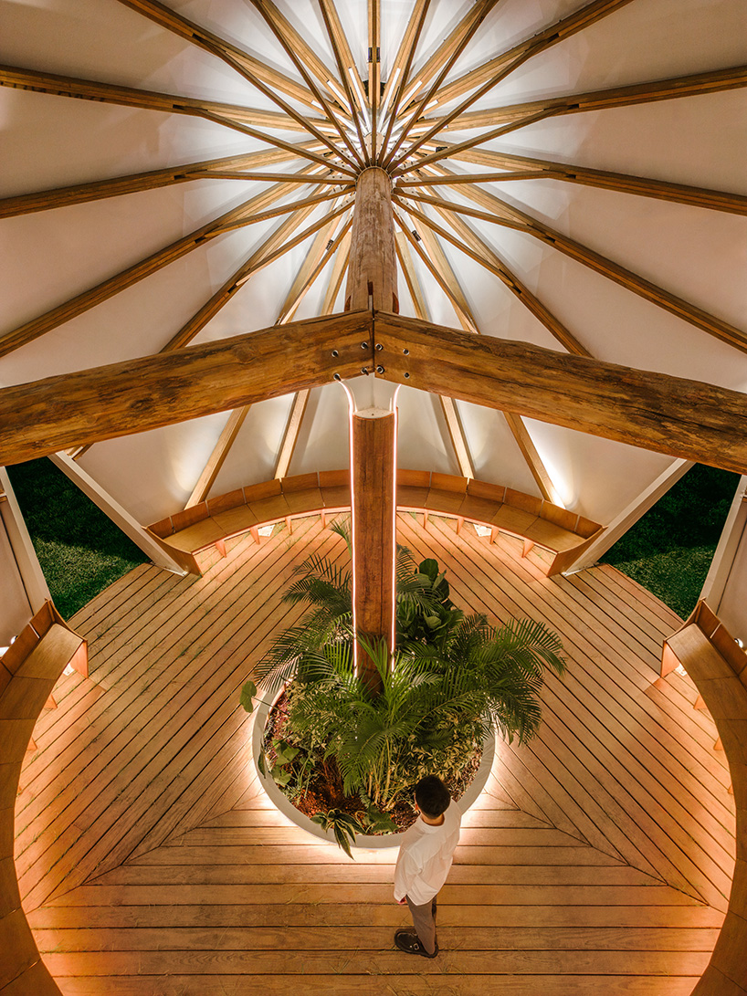 three angular canopies echo traditional oil-paper umbrellas in cheng tsung feng's installation