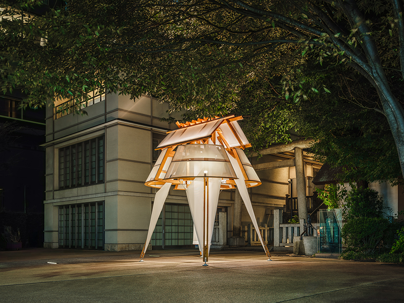 rhythmic layering of wood and fabric weaves sail-inspired installation by cheng tsung feng