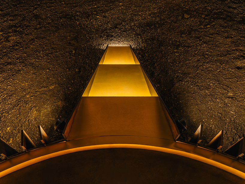 bent wooden beams fan like illuminating petals in cheng tsung feng&rsquo;s installation in taiwan