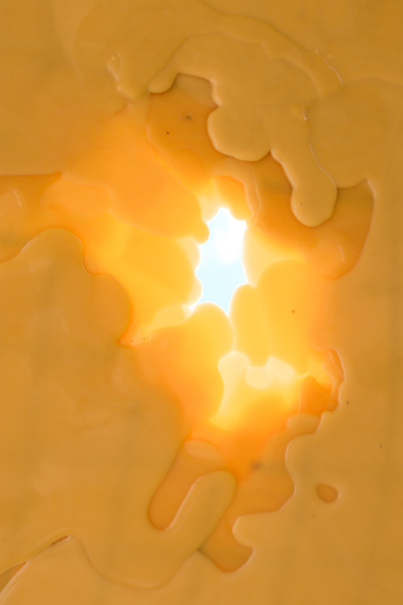 algae-based bio-resin puddle pavilion by i/thee hovers above mud creek in iowa