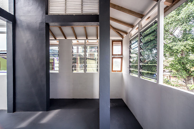 a 60cm void brings natural light and ventilation to an informal settlement in jakarta designboom