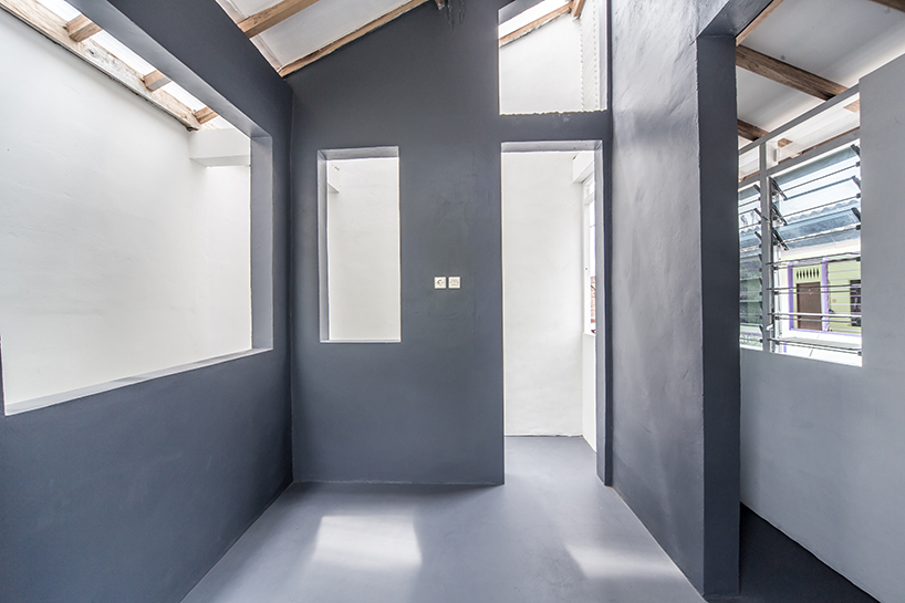 a 60cm void brings natural light and ventilation to an informal settlement in jakarta designboom