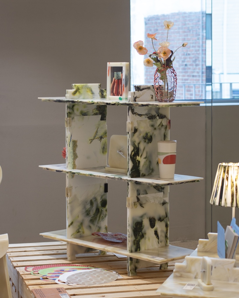 plastic marble display shelf turns upcycled materials into reconfigurable furniture